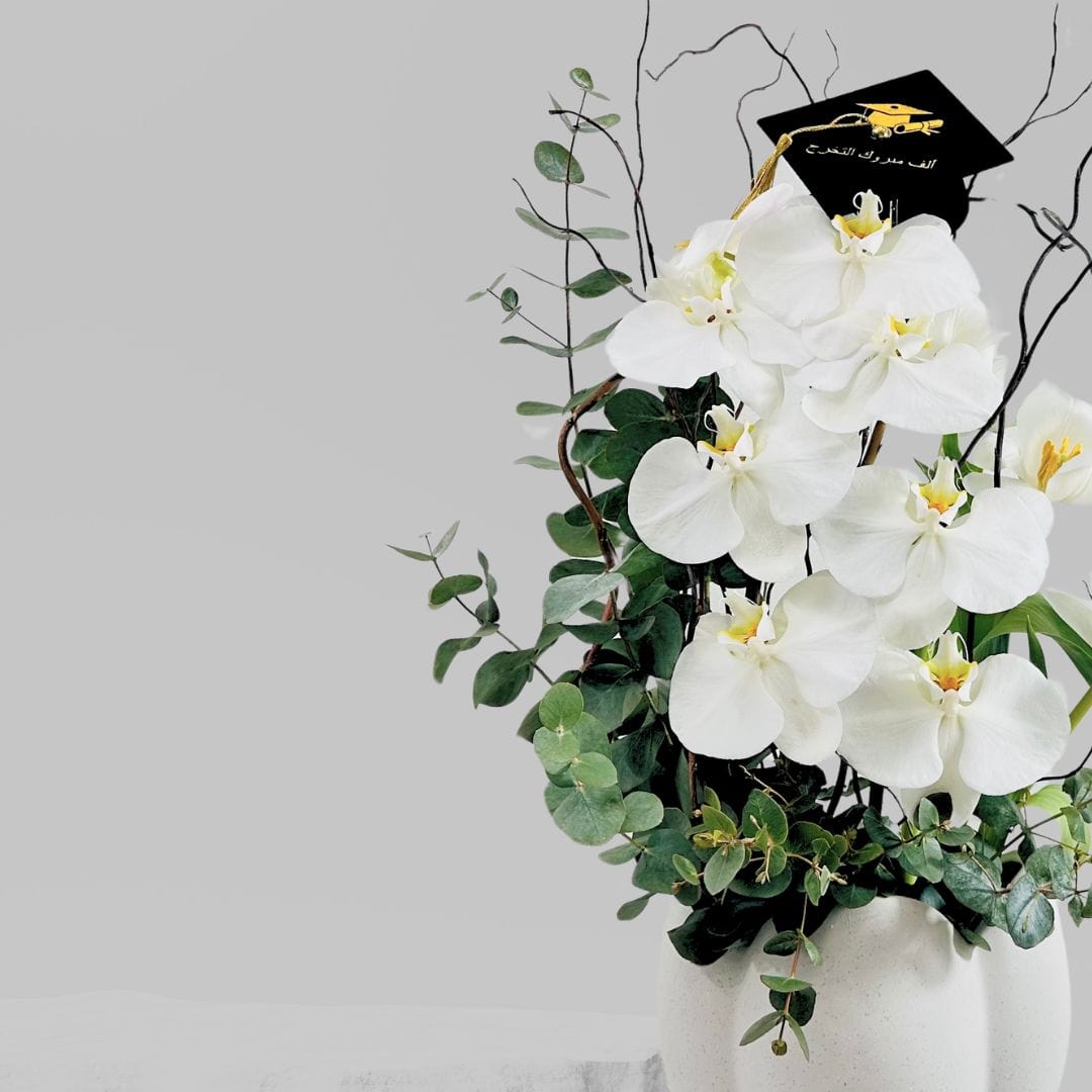 JENEEN FLOWERS GRADUATION ORCHID